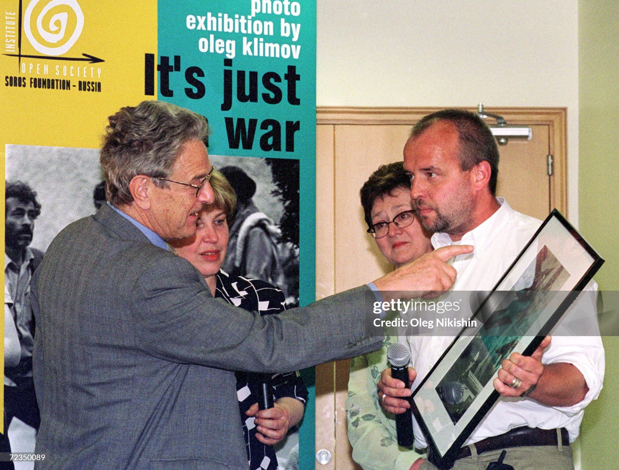 In the photo on the left is Soros, on the right is me. Photo by Oleg Nikishin for Getty Images