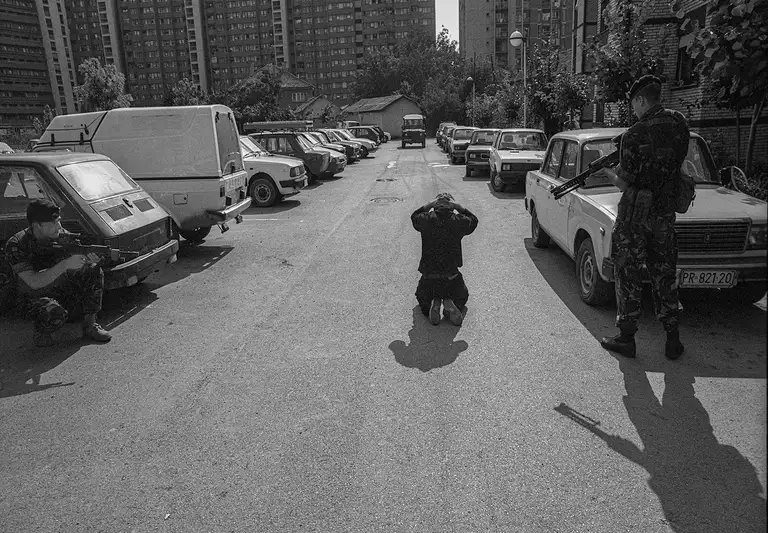 Detention and arrest of Pristina residents by NATO soldiers. Kosovo, June 1999. Photo by Oleg Klimov.