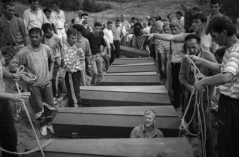 Funeral of victims of the military conflict between Serbia and Kosovo. Near Pristina, Kosovo. June 1999. Photo by Oleg Klimov
