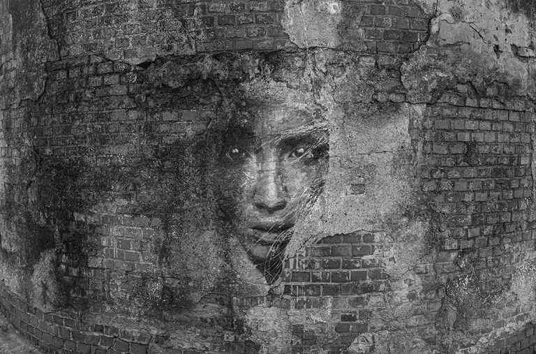A face emerging from cracked brick. Memory survives even when architecture collapses. Kaliningrad region, 02.03.2026. Photo by Oleg Klimov