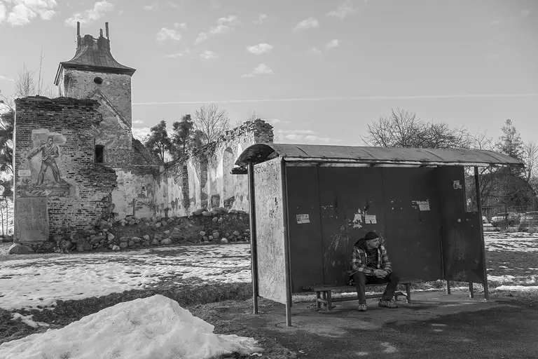 A bus stop near the ruins of an old church. History waits here longer than the buses. Kaliningrad region, 03.03.2026. Photo by Oleg Klimov