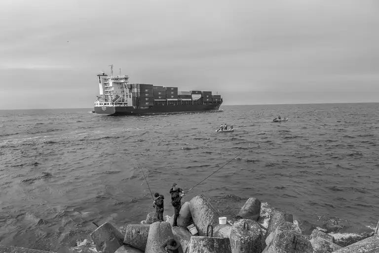 Fishermen along the shoreline of Russia's maritime border. Photo by Oleg Klimov