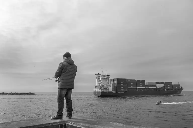 Fishermen along the shoreline of Russia's maritime border. Photo by Oleg Klimov