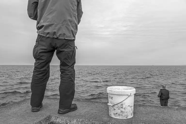 Fishermen along the shoreline of Russia's maritime border. Photo by Oleg Klimov
