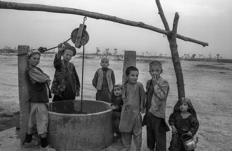 The well in the desert from which we all drank water. The beginning of Operation Enduring Freedom in Northern Afghanistan, October, 2001. Photo by Oleg Klimov