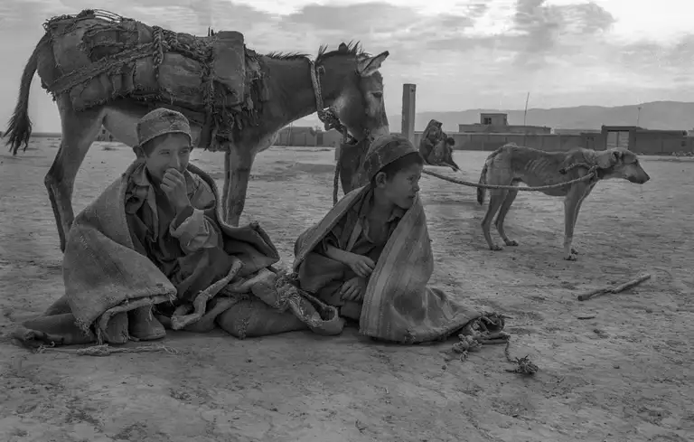Afghan travelers. The beginning of Operation Enduring Freedom in Northern Afghanistan, October, 2001. Photo by Oleg Klimov