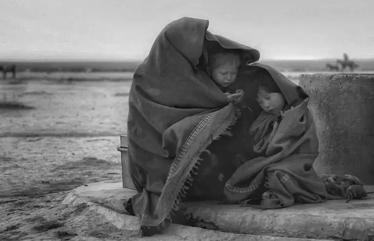 An Afghan family. The beginning of Operation Enduring Freedom in Northern Afghanistan, October, 2001. Photo by Oleg Klimov