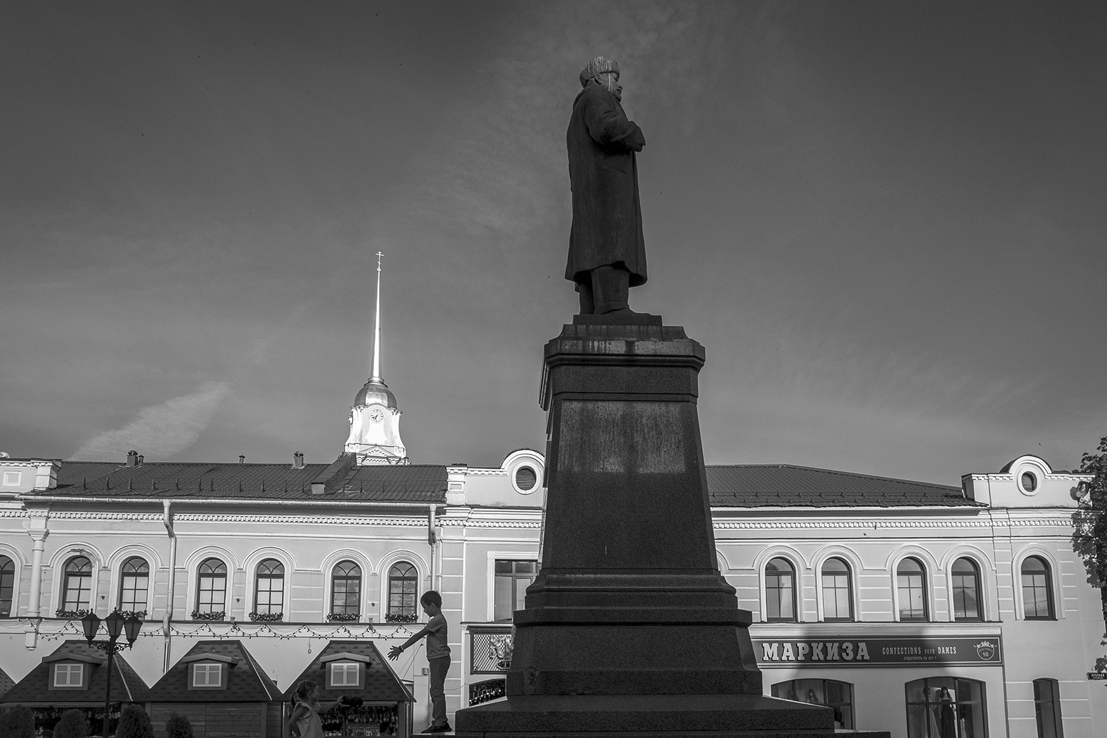 A boy and Lenin on Red Square. Rybinsk, Yaroslavl Oblast, Russia — because apparently Moscow does not have a monopoly on Red Squares. Photo by Oleg Klimov
